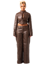 UMBER - CROPPED BIKER FITTED JACKET AND LOW RISE WIDE-LEG FRONT PANEL PANTS IN PREMIUM BROWN VEGAN LEATHER